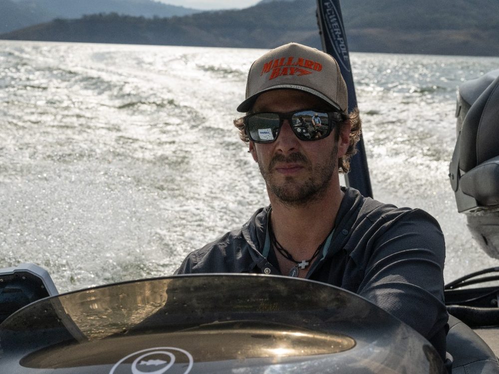 Federico Schoeneck, co-owner and operator of Beyond Trail Travel, at the helm offshore